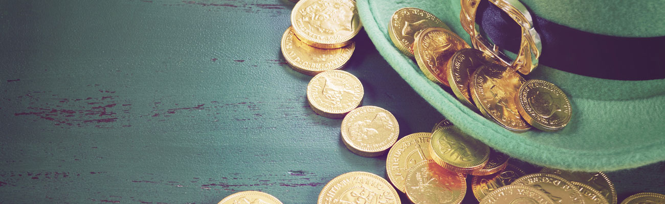 Leprechaun hat and gold coins for St. Patrick's Day