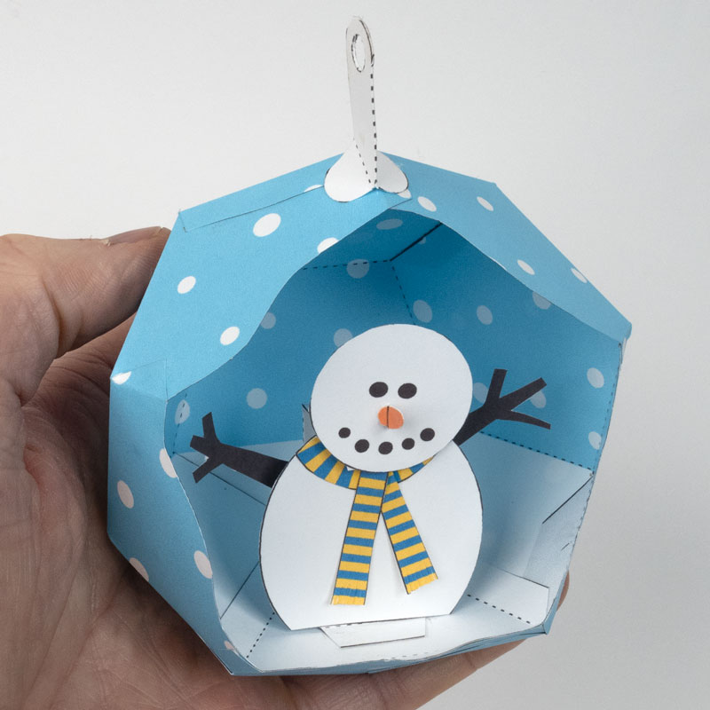 Ornamento com boneco de neve em movimento