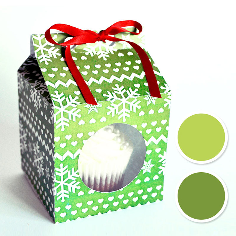 Caixa verde-escuro com símbolos de natal